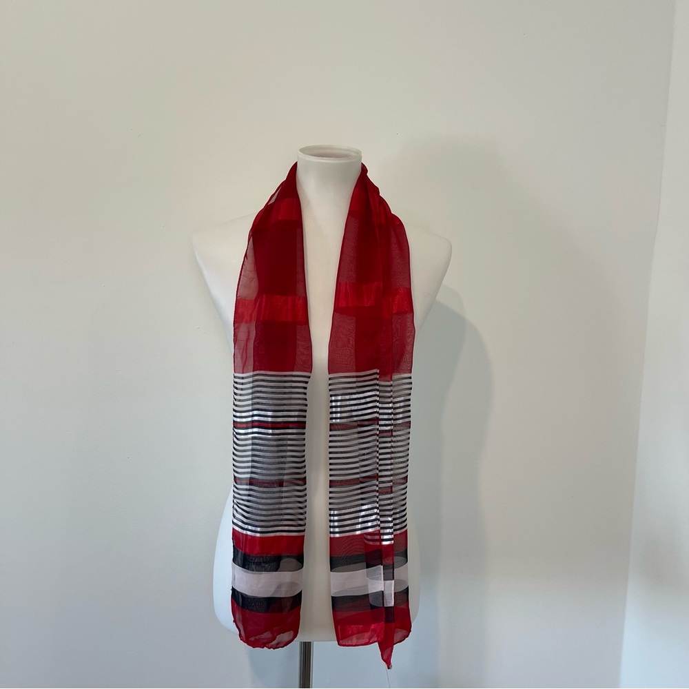 Lightweight red, black, white satin scarf.